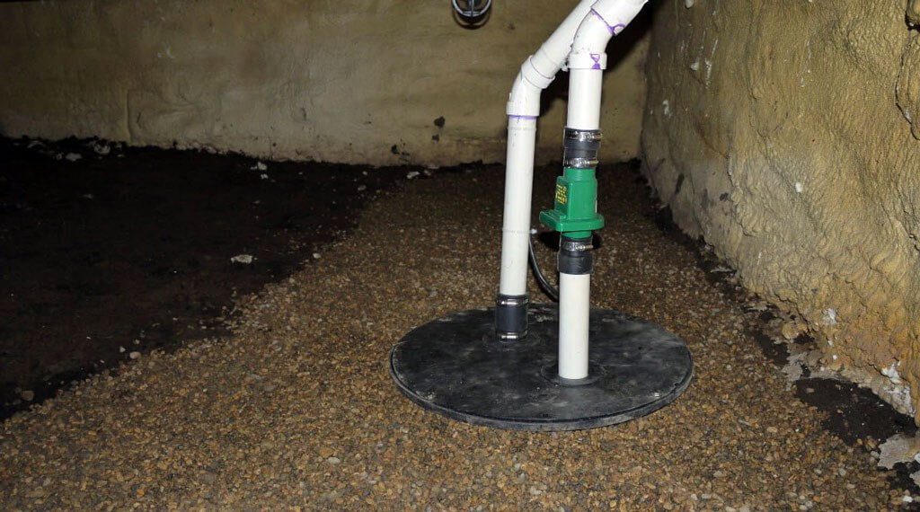 Covered sump pump drain in the basement