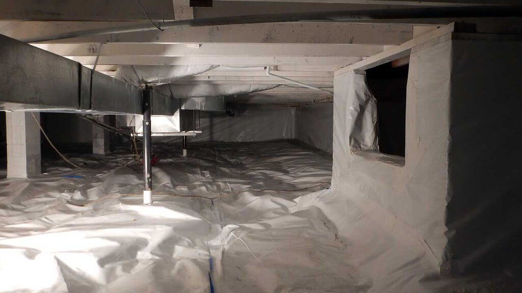 Under home crawl space with window and ducts