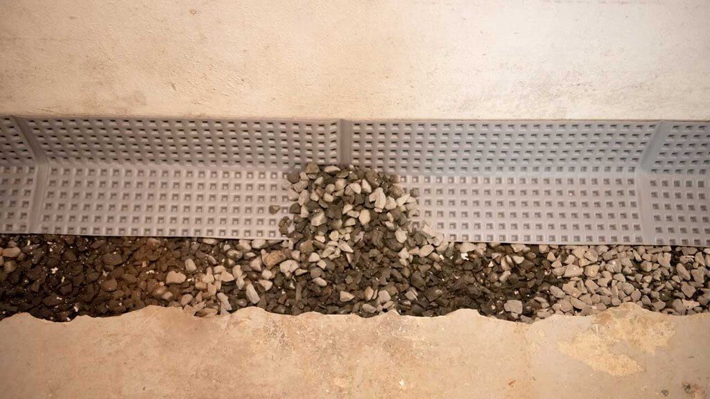 Waterproofing grates