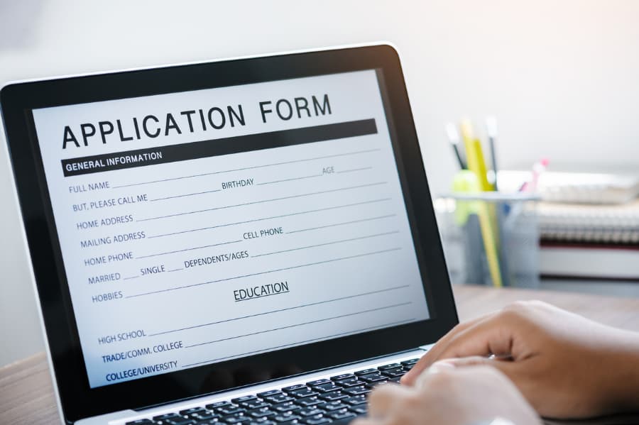 Prospective employee filling out a job application form online