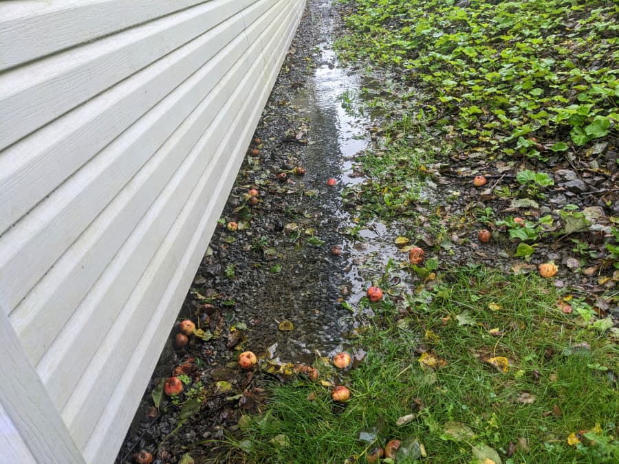 Pooling water beside home foundation