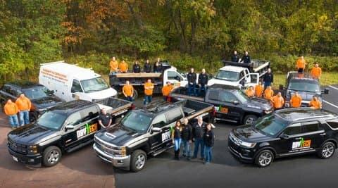 Dry Tech Waterproofing team and vehicles