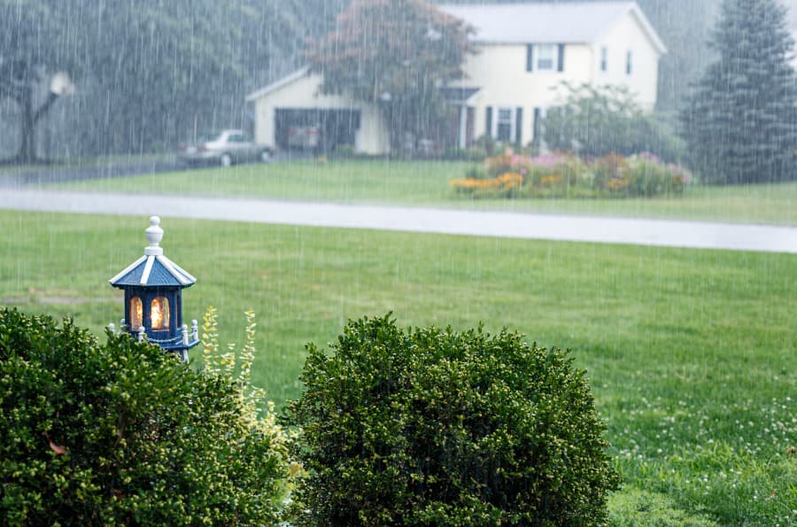 Residential front yard during heavy rain